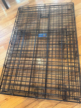 Load image into Gallery viewer, Petsmart double door dog crate for large dogs. 42 x 28 x 30 $95 retail. Has divider for 2 smaller dogs. Foldable
